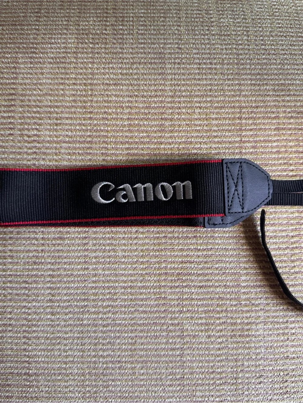 Canon Black Neck Strap with Red Trim and White Logo